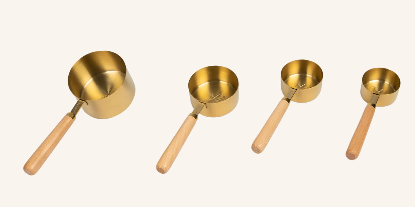 סט 4 כוסות מדידה בגוון זהב